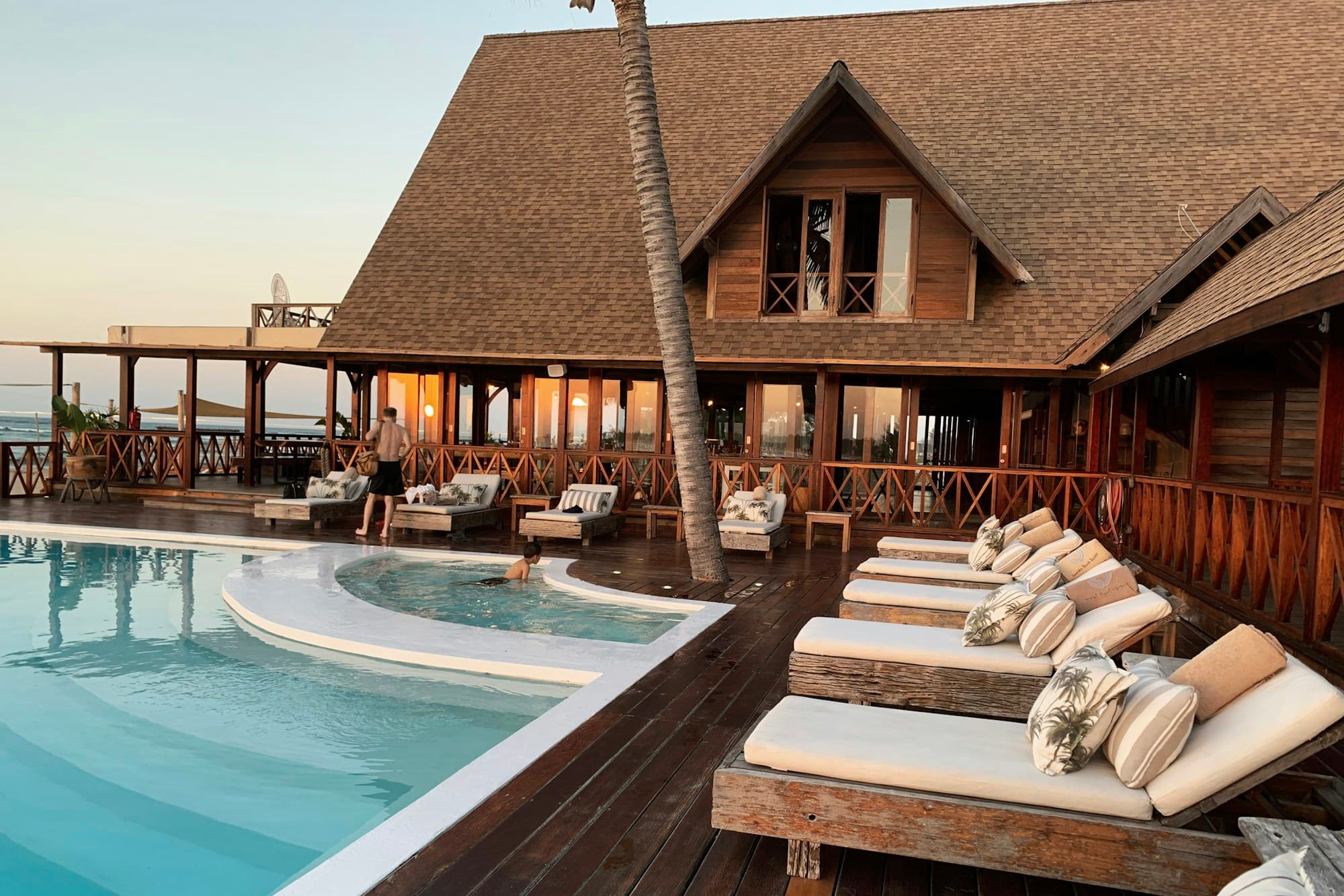 Tropical waterfront resort with a calm swimming pool